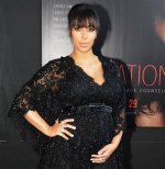 Kim Kardashian's Pregnancy Rumors: the Connection with Travis Kelce
